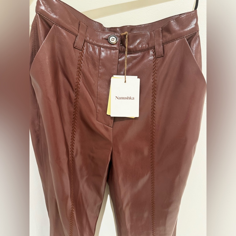 Nanushka size small faux leather pants with slit